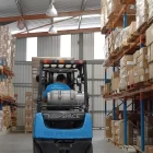 Inside KeepSpace 3PL's Perth warehouse, a team member picking a pallet with a forklift.